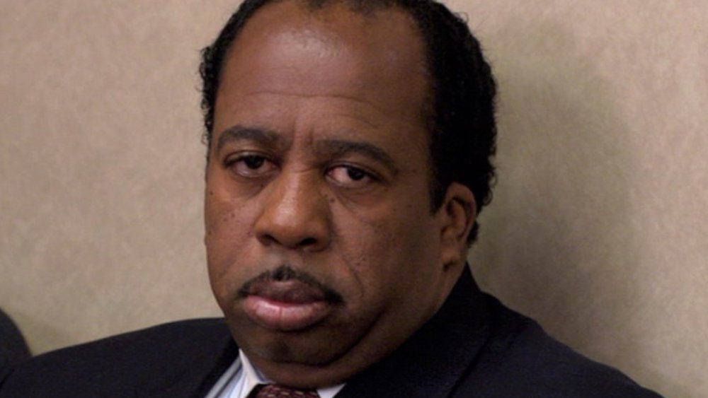 Image of character Stanley Hudson looking bored