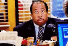 Animated gif from season 3 episode 5, where Stanley stands up and rushes to the line after it is announced that this is Pretzel Day